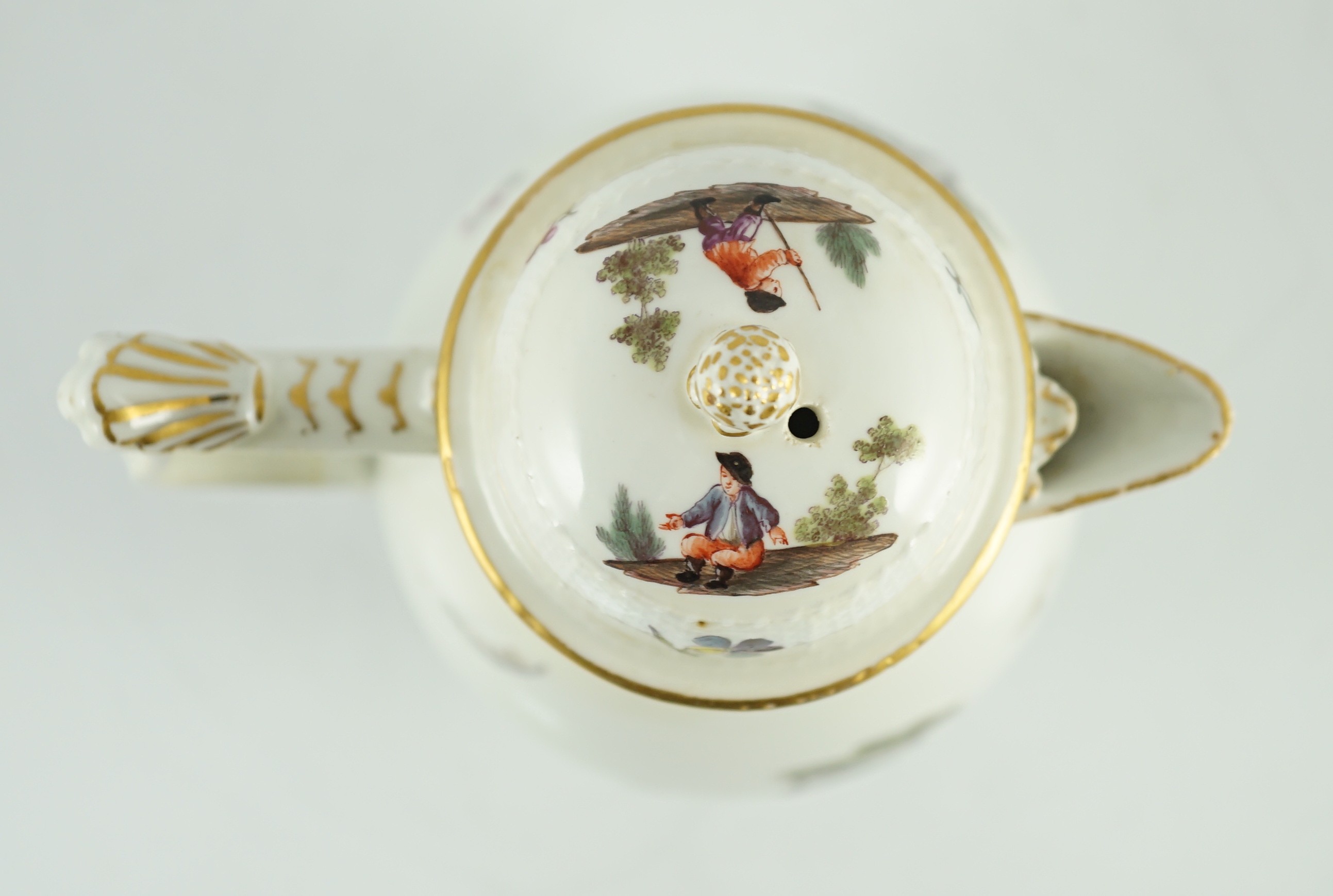 A Meissen coffee pot and cover, c.1760, 23cm high, discoloured restoration